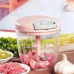 Outil de cuisine : hachoir rose pour viande